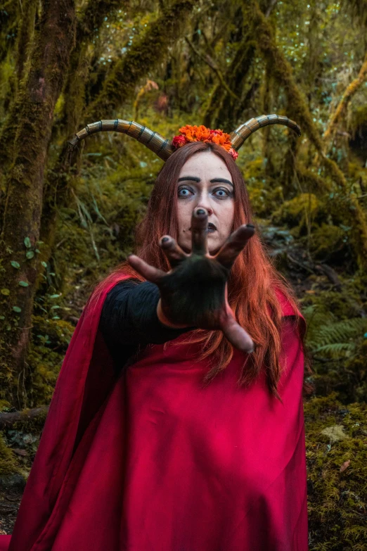 a person dressed as a devil with horns