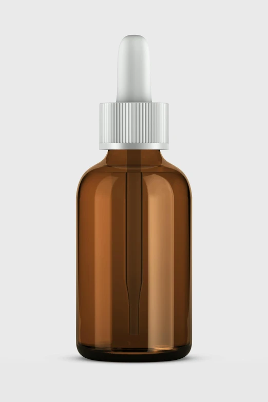 a brown glass bottle with white lid sitting on a gray background