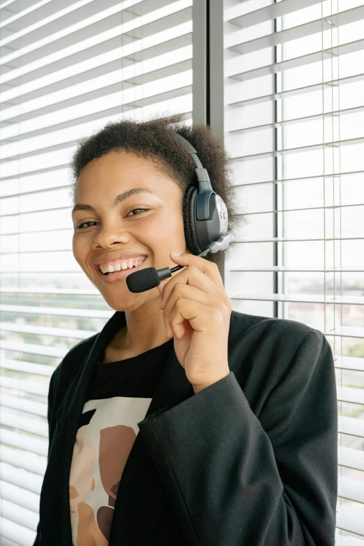 smiling girl listening to music with headphones