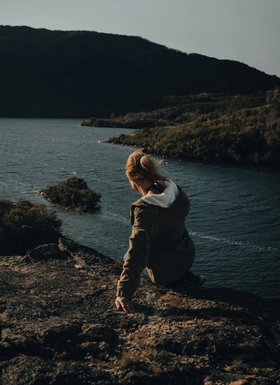  walking towards the water at dusk