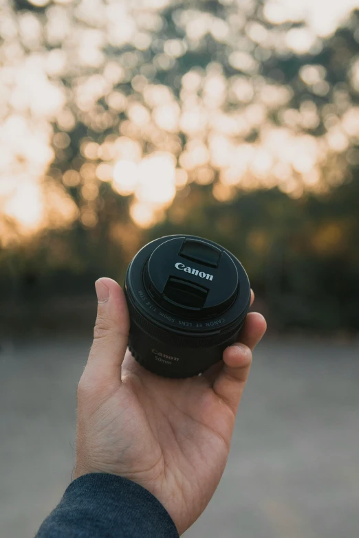 a camera that is on top of a finger