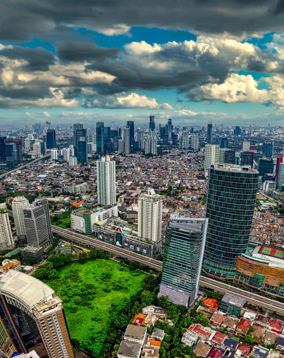 an overhead s of the city and a soccer field