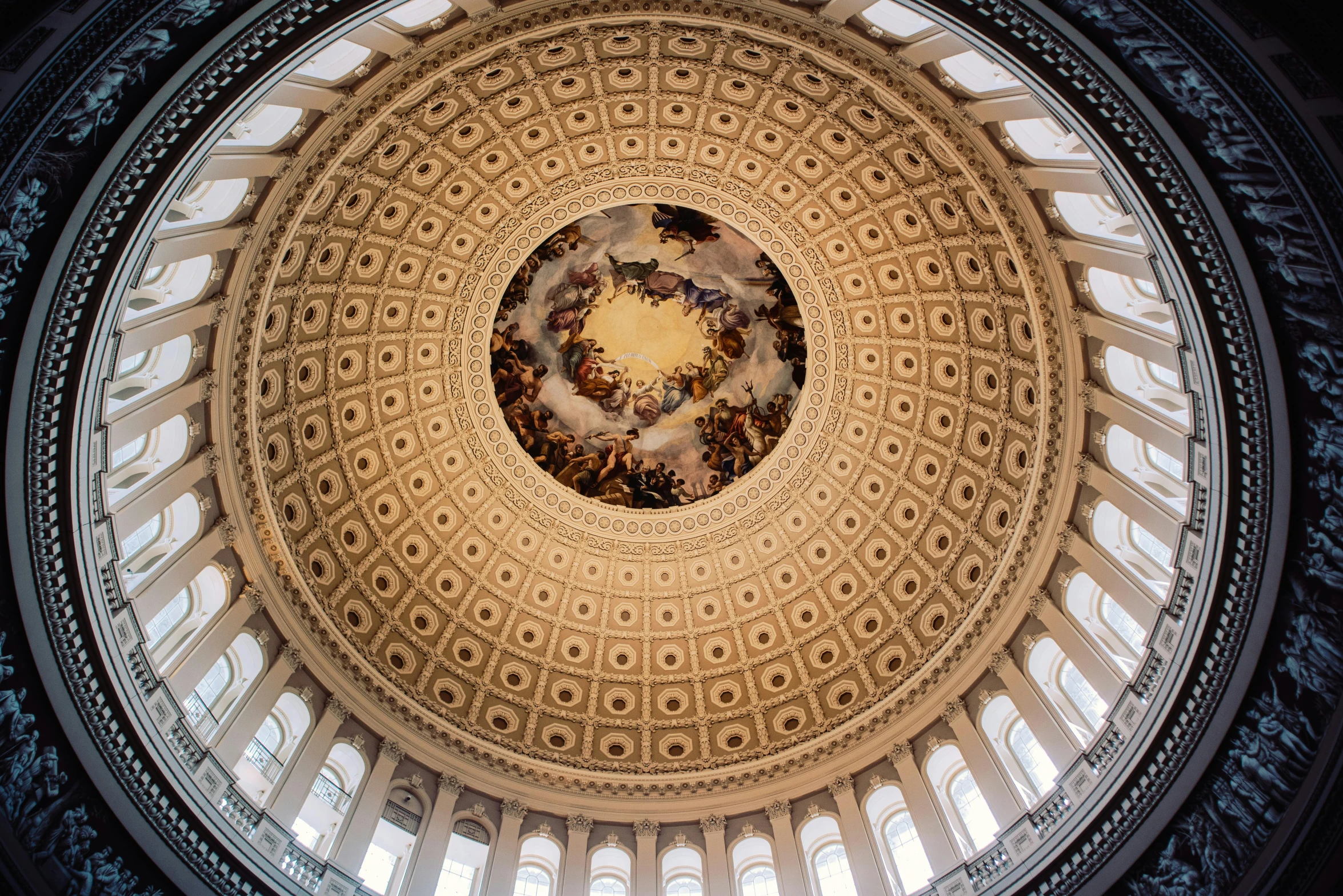 looking up at the dome and its ornate design