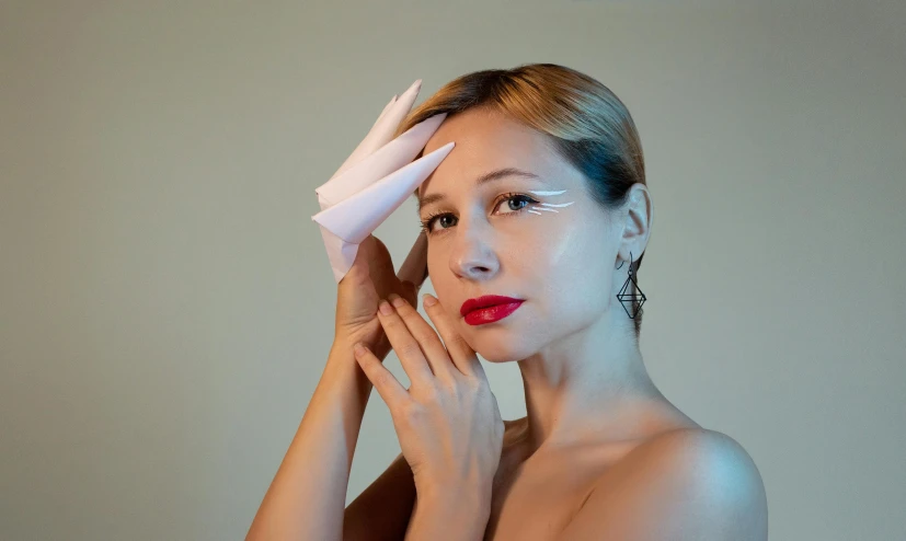 a woman with a towel over her head