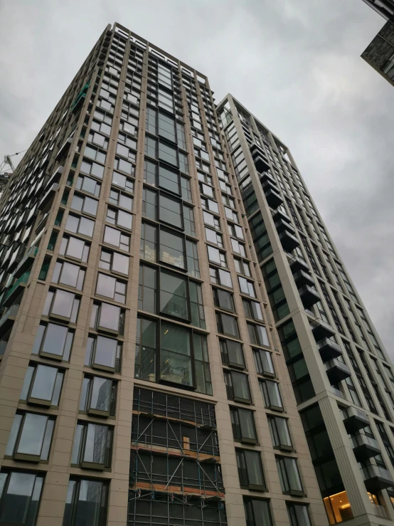 this tall building is very large and has many windows