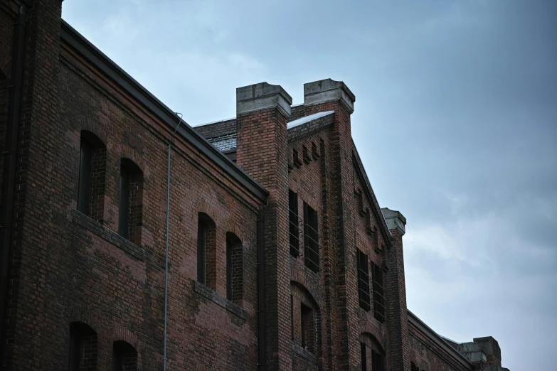 there is a clock tower on the top of an old building