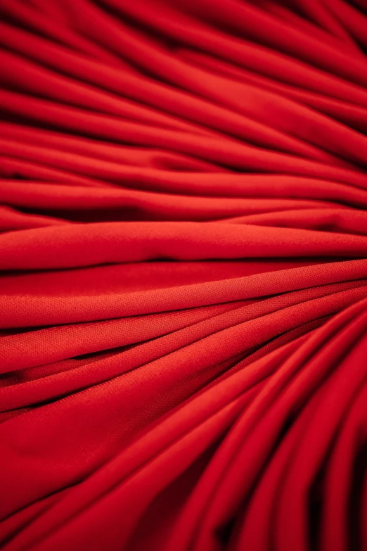 the top of a red fabric with red lines on it
