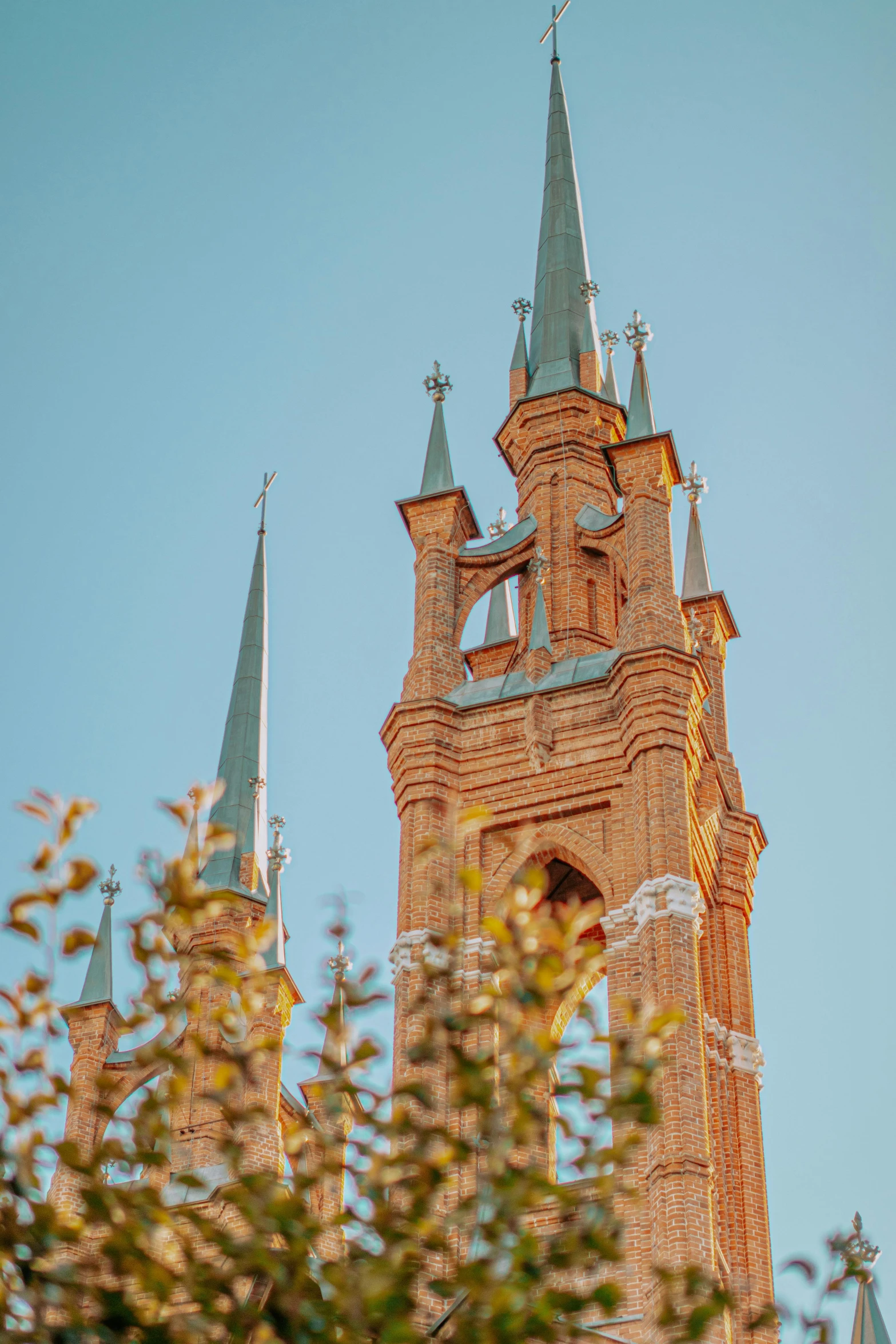 a church spire with a blue sky background