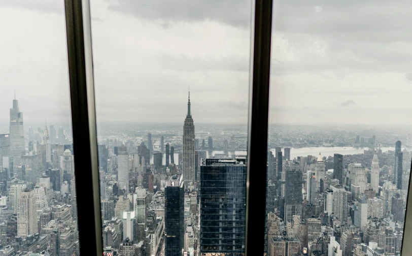 a view from a window looking at the city