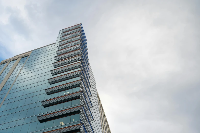 tall building made of glass with a lot of windows