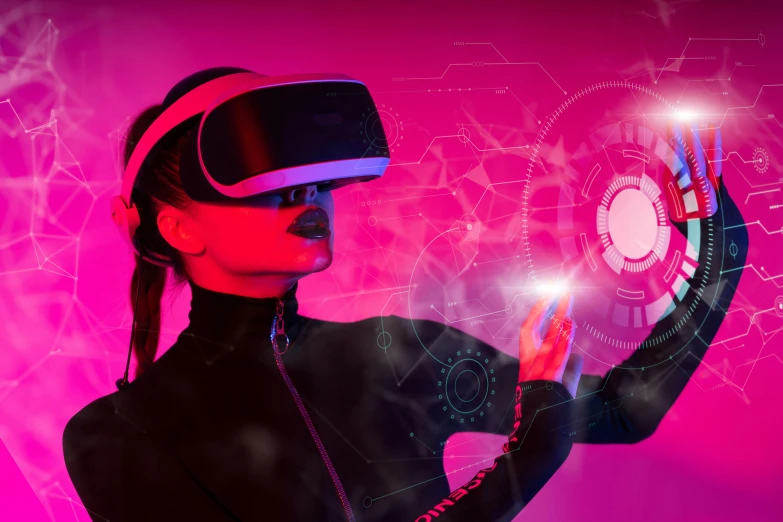 a girl in virtual reality holding an electronic device