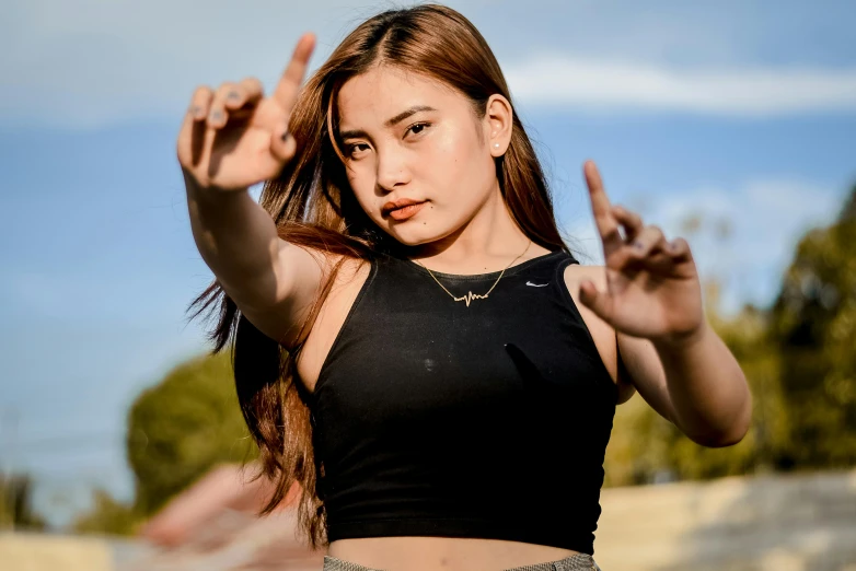 a woman showing off her very beautiful body and hands