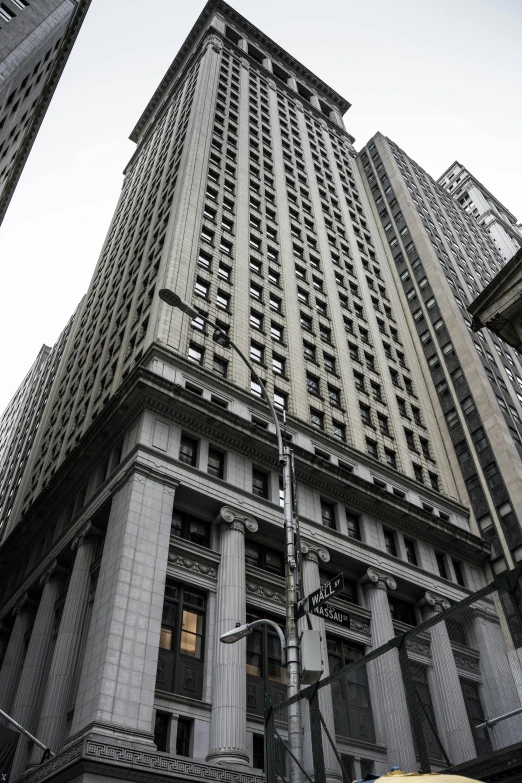 an empty street in front of large buildings