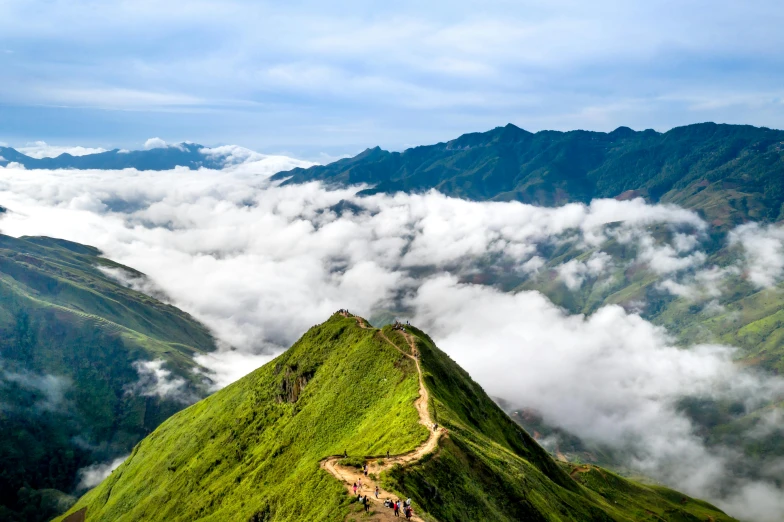 clouds drift over the mountains above the ridge