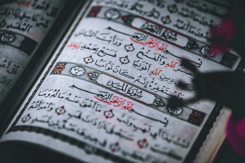 an old, open islamic book on display in an antique book