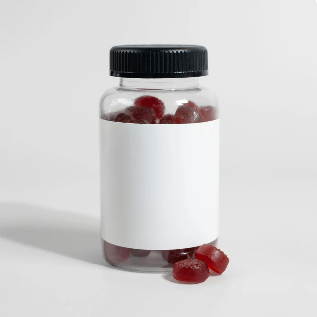 a jar with a few jelly beans inside