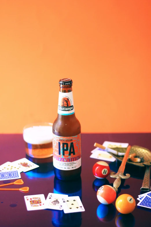 a bottle and some items on a table