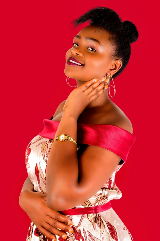 a woman posing in a red and white dress