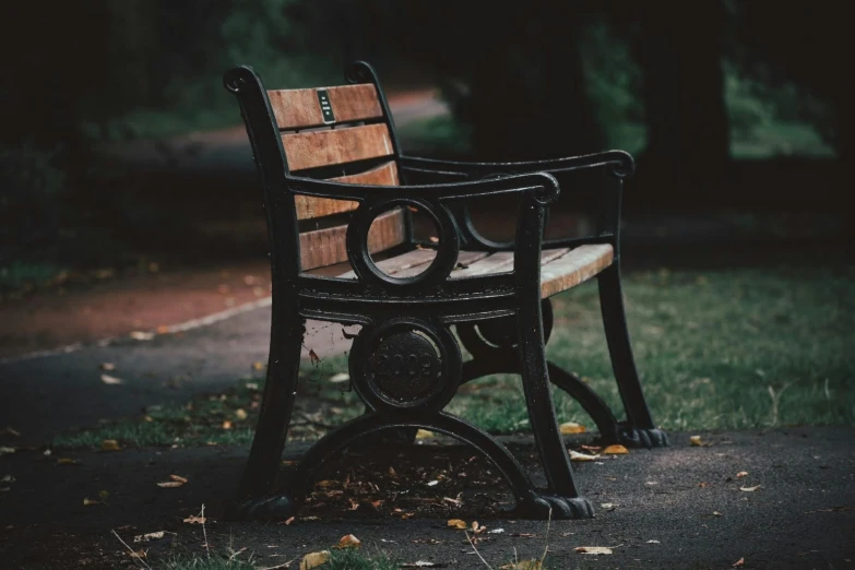 a bench sitting on the side of a street