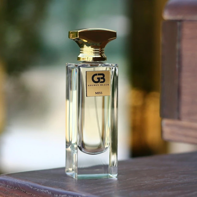 an old bottle of perfume is displayed on the table