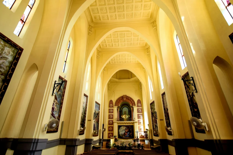 looking up the aisle to a cathedral with altars