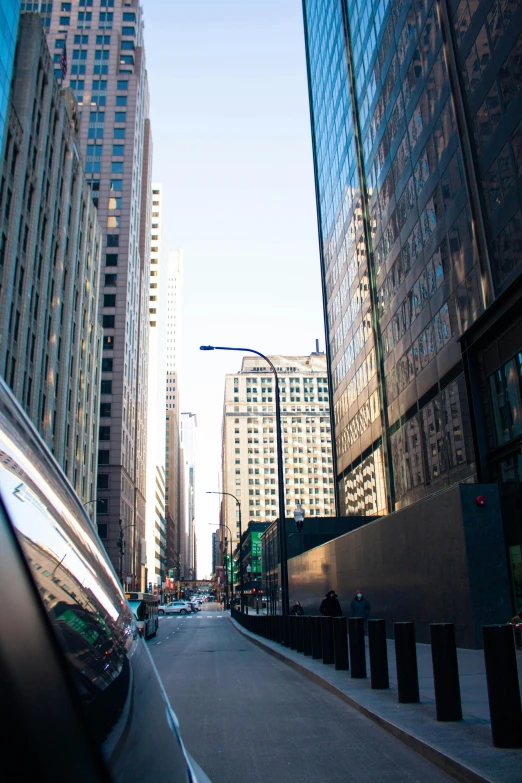 a city street filled with tall buildings near traffic