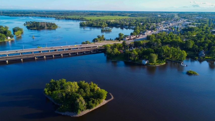 there is a long bridge spanning the width of an island