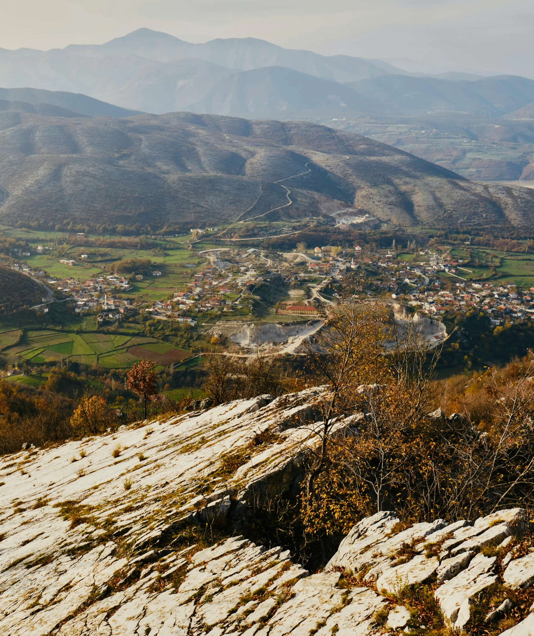 a mountain landscape with many mountains in the background