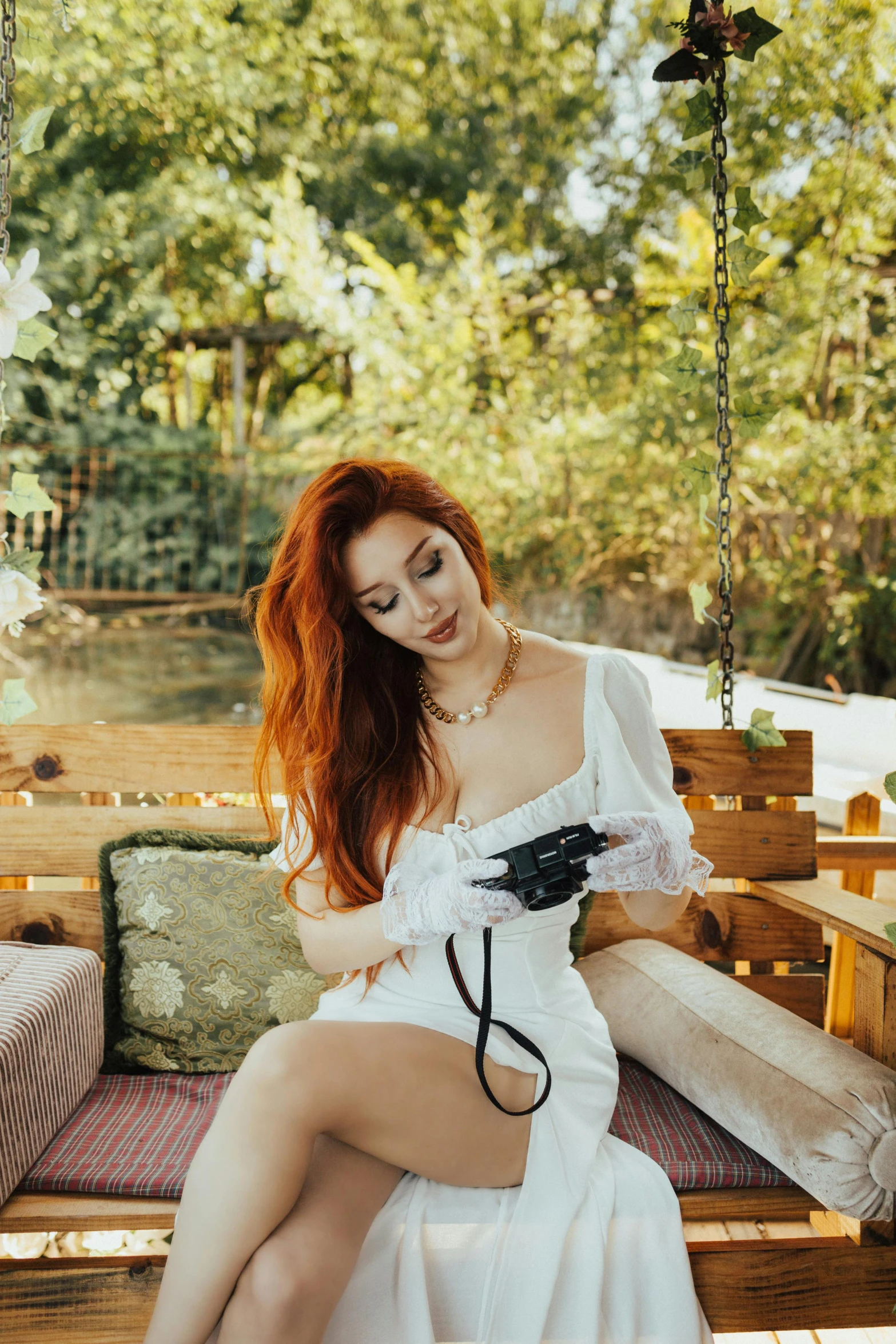 an image of a woman wearing a white dress sitting on a porch swing