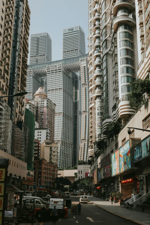 a group of tall buildings on a city street