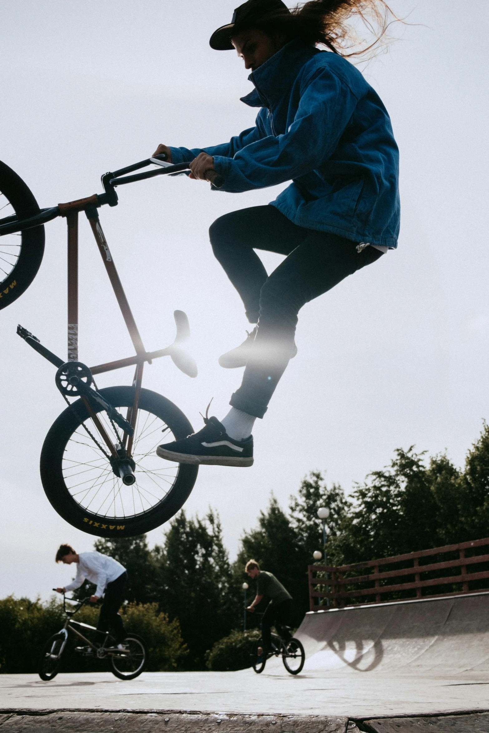 a young man riding a skateboard up the side of a ramp