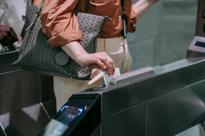 person using digital pos terminal in airport