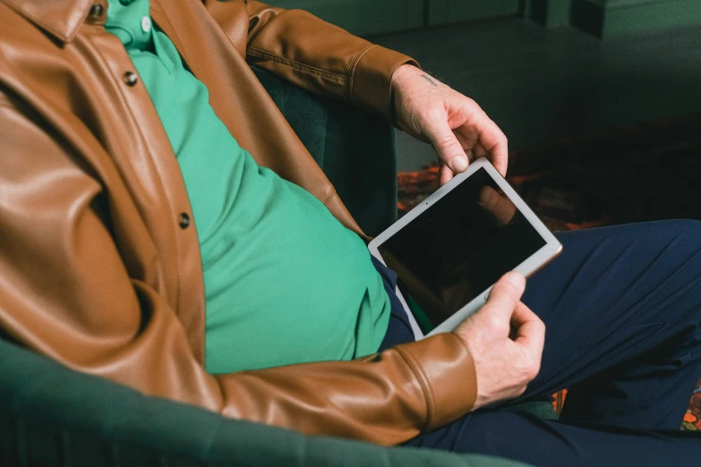 a person using an electronic device on their lap