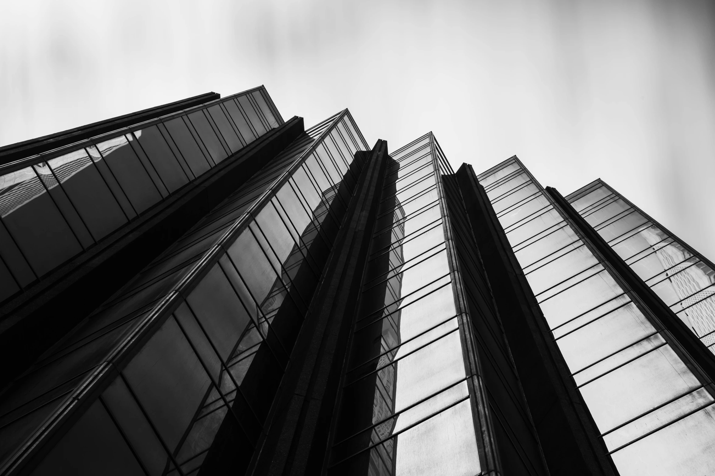 looking up at the side of a tall building