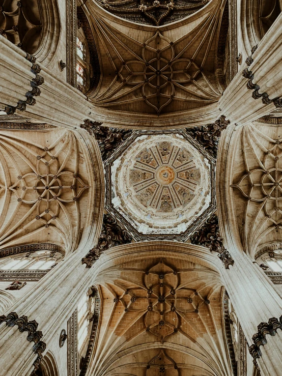 inside a cathedral with ceiling and pillars