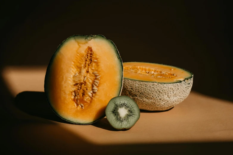 a half - eaten cantaloupe has a piece cut out with the skin on it