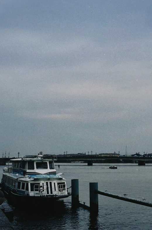 a large river boat docked in the water