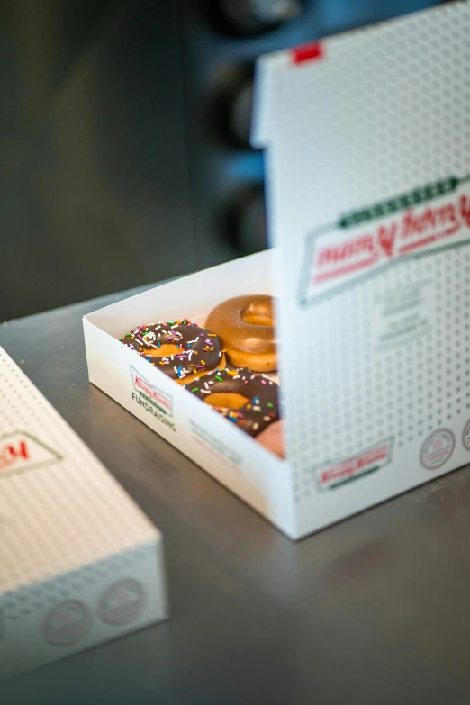 several donuts are sitting inside of a box