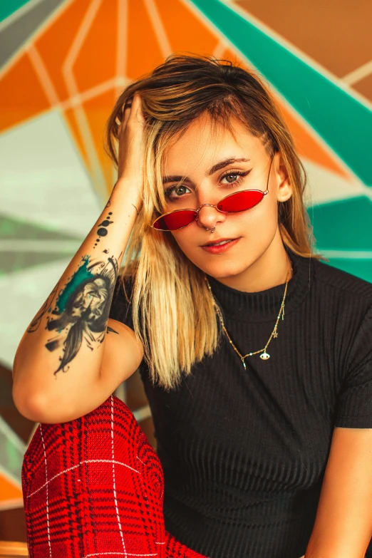 a young woman wearing red eye patch on her eyes