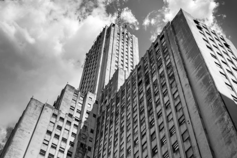 a black and white po of two tall buildings