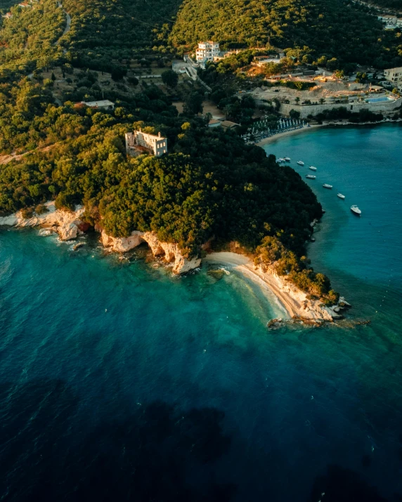 an aerial view of a sandy island in the ocean