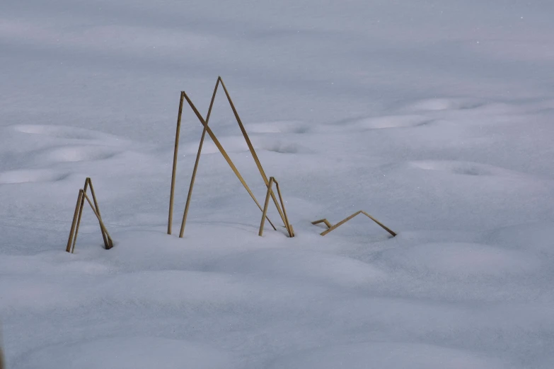 several small items that have been placed on top of snow