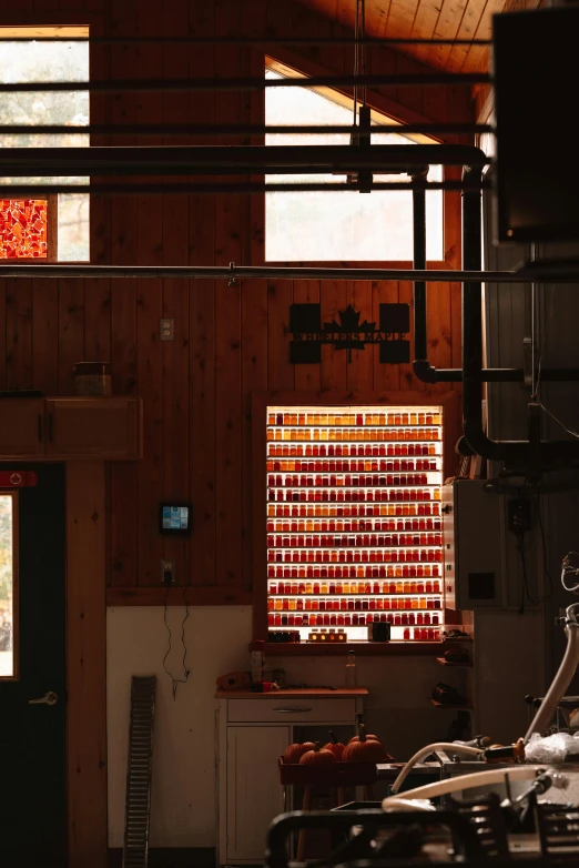 a room with wood paneling and stained glass window