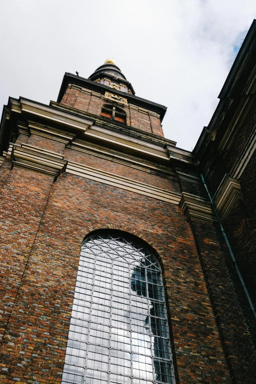 a building with glass windows and a roof