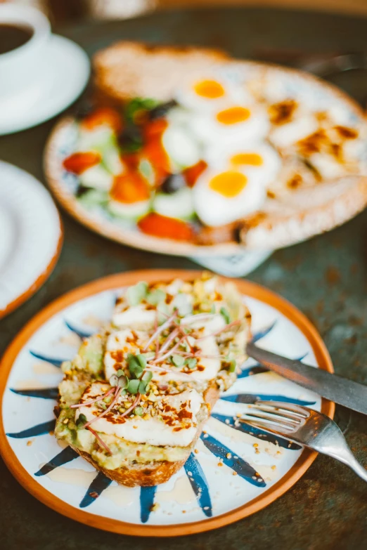 a plate has eggs and vegetables on it