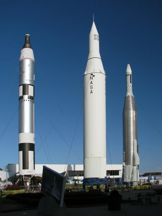 a couple of rockets that are standing in the dirt