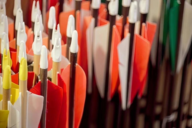 a row of colorful umbrellas are next to each other