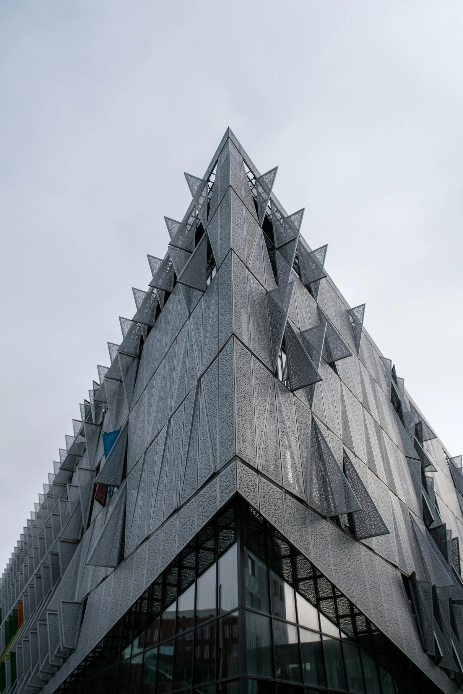 looking up at the building with modern architecture