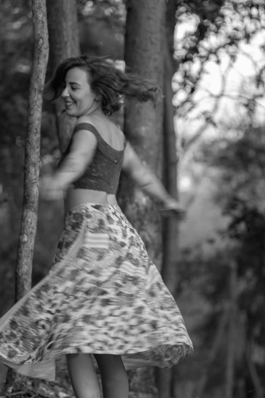 girl jumping in the air on a skateboard