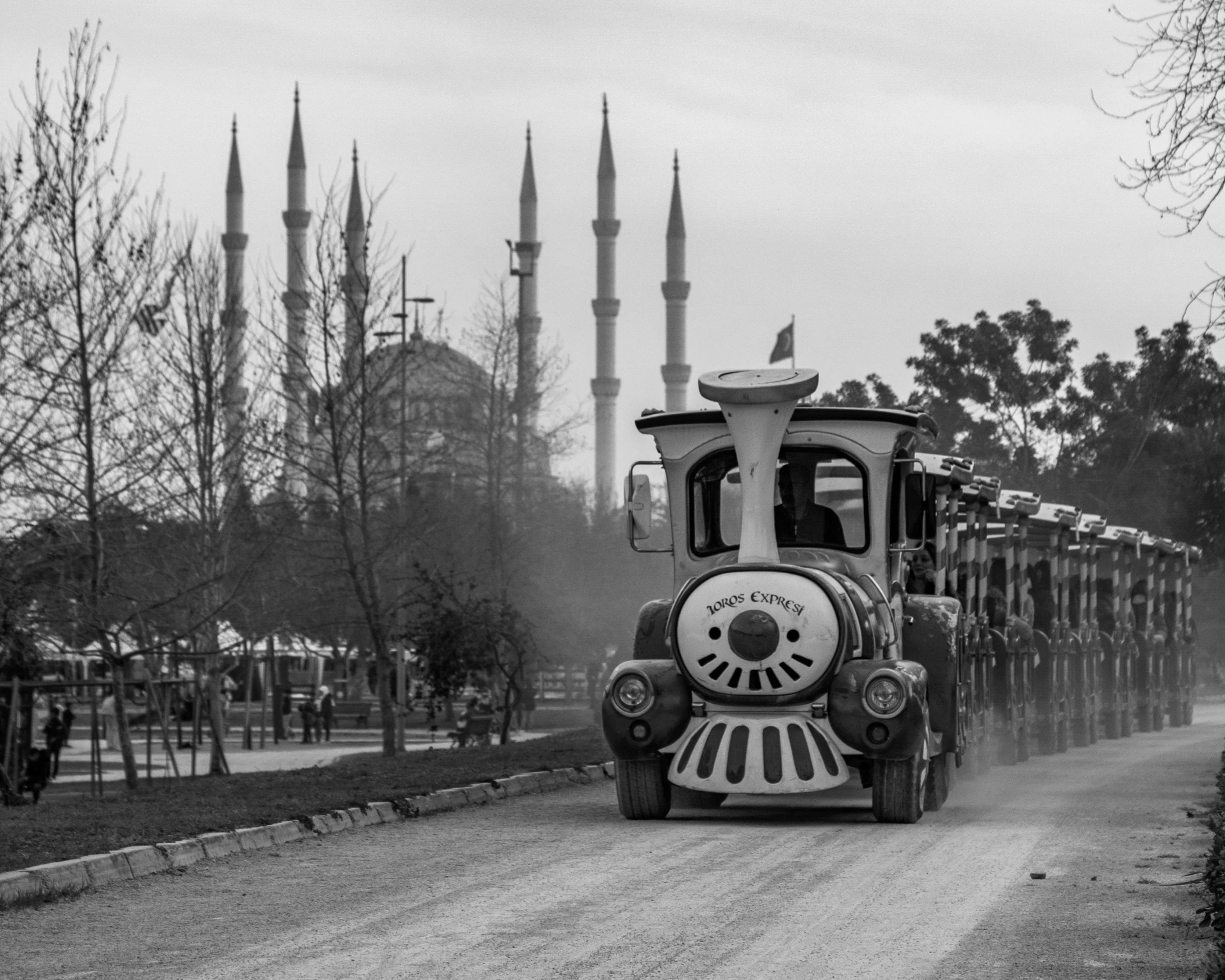 a train is traveling down the road